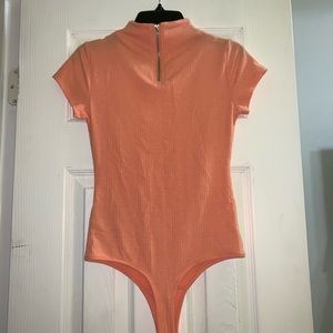 Peach half zip bodysuit